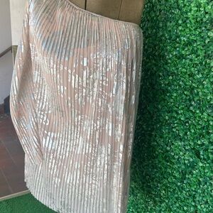 Silver and light peach off the shoulder one sleeve dress.